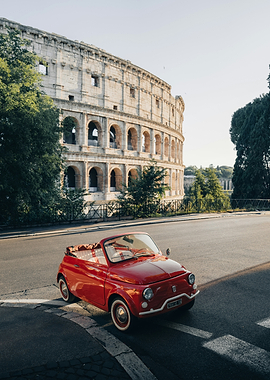 Red Fiat 500 in front of the Colosseum