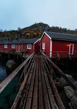 Red Fishing Huts on Wooden Pier