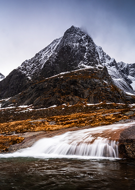 Snow-Capped Mountain and Waterfall