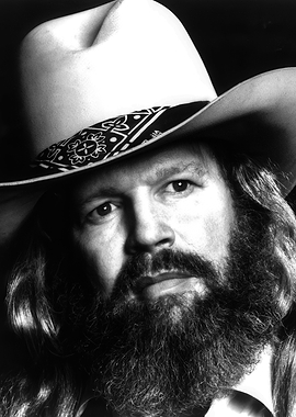 Close-up of a man in a cowboy hat