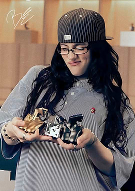 Billie Eilish gold and black figurines