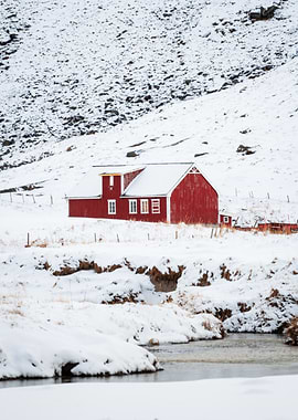 Red barn in snowy landscape