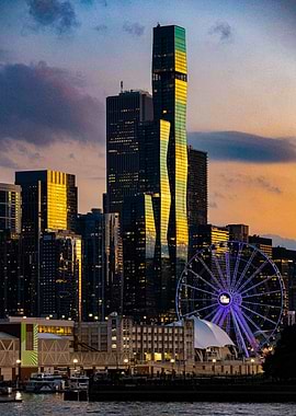 Cityscape at Dusk with Ferris Wheel
