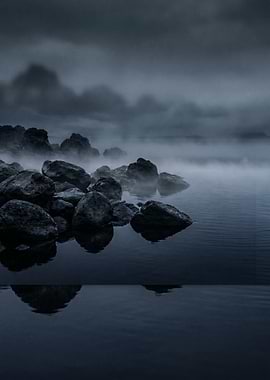 Misty Rocky Shoreline at Dusk