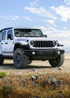 White Jeep Wrangler in Desert Landscape