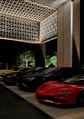 Luxury Cars Lined Up at Night