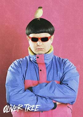 Oliver Tree with a bird on his head