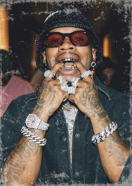 Man with gold teeth and jewelry