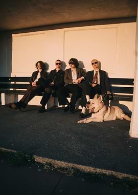 Four men and a dog on a bench