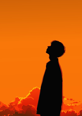 Silhouette of a person looking up at sunset