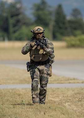 French Soldier in camouflage gear with rifle