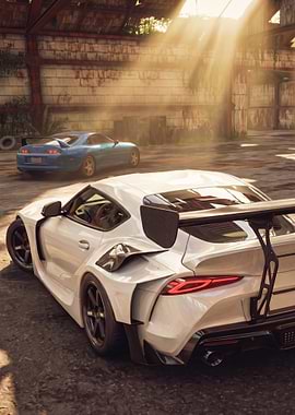 White and Blue Toyota Supras in Hangar