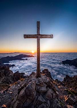 Wooden Cross on Mountain Peak