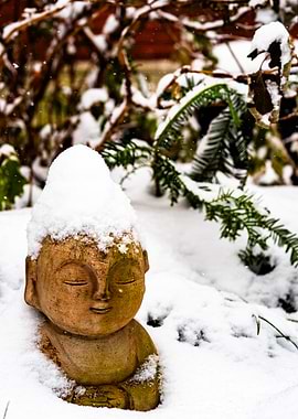 Snow-Covered Little Buddha Statue