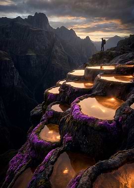 Hiker at Sunset Above Mountain Pools