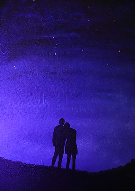 Couple Silhouetted Under Starry Night Sky