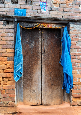 Rustic Wooden Door with Blue Towels