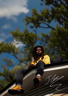 J. Cole Sitting on a Roof