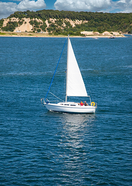 Sailboat Sailing on Blue Water