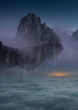 Floating Mountain Peaks Above Clouds