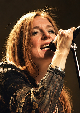 Female Singer Performing Live on Stage