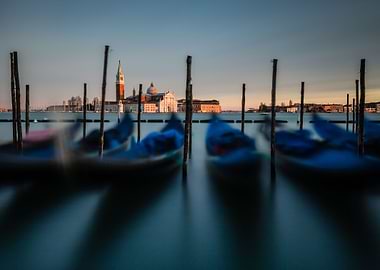 Waving gondolas in Venice, San Giorgio Maggiore in the ...