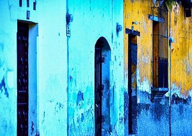 Doors. Altered tones on a deteriorated wall of doors in ...
