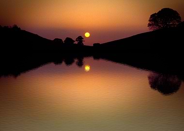 Sunset over Bruton Lake, Somerset. A secret lake, you w ...