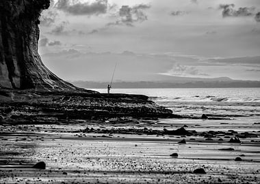 Fisherman on the rocks, Wai-Iti New Zealand