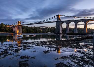 The Menai Suspension Bridge links the island of Anglese ...
