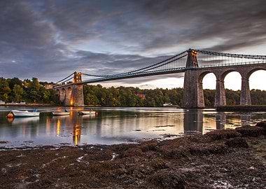 The Menai Suspension Bridge links the island of Anglese ...