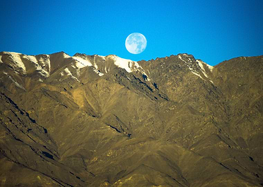 The moon, escaping the daylight.