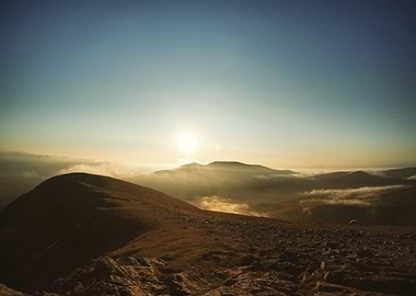 View of the sun setting from the summit of Blencathra