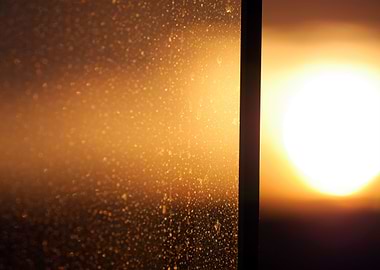 Sunset offset by dirty glass