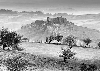 Carreg Cennen castle sits high on a hill near the River ...