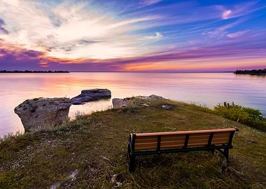 Bench in sunset scene