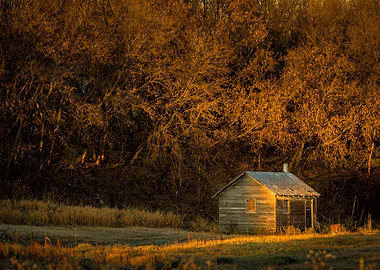 Old house in sun rays