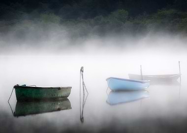 boats in the morning mist in Llanberis, Gwynedd, North ...