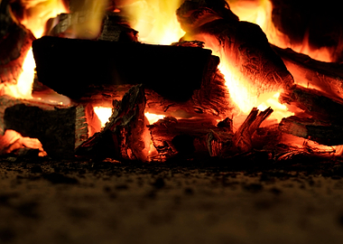 Photograph of charcoal pieces and fire flames