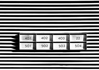 Industrial letterboxes on an abstract monochrome backgr ...