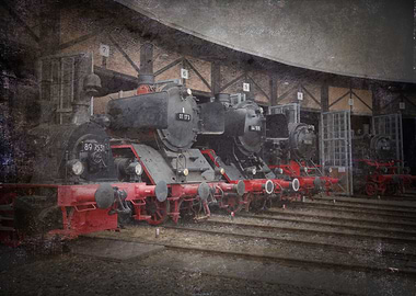 Locomotives on the rails in depot. Old steam trains. He ...