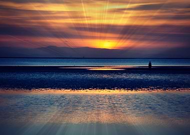 an image of a beautiful sunset at Anthony gormleys anot ...