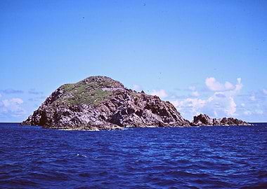 Lonely mountain cliffs in the ocean.