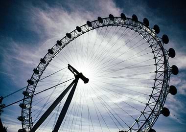 The silhouette of the London Eye on a bright afternoon. ...