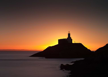 Daybreak at Mumbles lighthouse, an iconic structure in ...