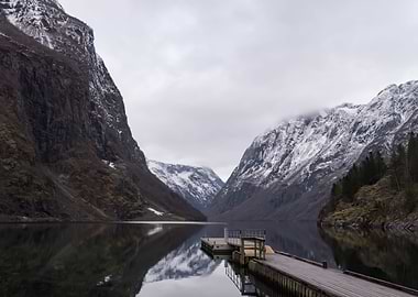 Gudvangen fjord view in winter with snow topped mountai ...
