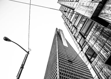 pyramid building and modern building in black and white ...
