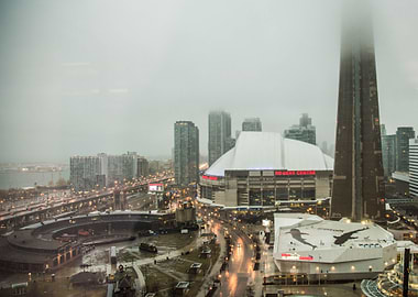 An amazing cityscape of a foggy Rogers Centre with the ...