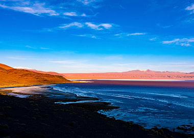View over red lake in Bolivia. With Flamingo's.