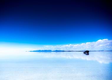 Landcruiser Jeep reflecting on Salar de Uyuni